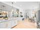 Spacious kitchen with island and eat-in area, lots of natural light at 5610 N River Shore Dr, Tampa, FL 33603