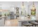 Bright kitchen with stainless steel appliances and white cabinetry at 5610 N River Shore Dr, Tampa, FL 33603