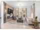 Sophisticated living room featuring a fireplace, unique lighting, and modern furniture, creating a welcoming space at 5610 N River Shore Dr, Tampa, FL 33603