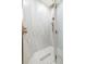 Luxurious walk-in shower featuring marble tiling and modern fixtures, providing a spa-like retreat at 5610 N River Shore Dr, Tampa, FL 33603