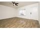 Inviting living room showcasing tile flooring, neutral paint, and plenty of natural light at 5670 Postma St, North Port, FL 34287