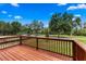 Beautiful view from the back deck of lush green grass and large trees at 5865 Creek Ridge Rd, Brooksville, FL 34601