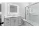 Modern bathroom features a light-up mirror and glass enclosed shower at 5865 Creek Ridge Rd, Brooksville, FL 34601