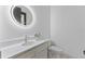 This half bath features modern fixtures and decorative tile flooring at 5865 Creek Ridge Rd, Brooksville, FL 34601