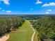 Beautiful golf course with a winding cart path surrounded by lush greenery at 5865 Creek Ridge Rd, Brooksville, FL 34601