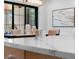 Kitchen island with marble countertop and convenient pop-up power outlet, perfect for modern living at 5865 Creek Ridge Rd, Brooksville, FL 34601