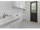This mud room features a sink and storage at 5865 Creek Ridge Rd, Brooksville, FL 34601