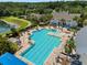 Resort-style pool with ample lounge seating and lush landscaping, perfect for relaxation at 5865 Creek Ridge Rd, Brooksville, FL 34601