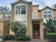 Inviting two-story townhome featuring manicured landscaping and a welcoming entrance at 6405 Osprey Lake Cir, Riverview, FL 33578