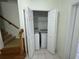 Laundry area features a washer and dryer conveniently located near stairs at 6405 Osprey Lake Cir, Riverview, FL 33578