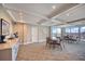 Elegant common room with plush seating, dining area, and scenic views through large windows, perfect for gatherings at 700 Beach Ne Dr # 705, St Petersburg, FL 33701