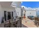 Spacious rooftop terrace offering ample seating, tables, and views, ideal for outdoor entertaining and relaxation at 700 Beach Ne Dr # 705, St Petersburg, FL 33701