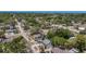 High angle shot of neighborhood streets, mature trees, and neatly organized houses at 705 Cypress St, Tarpon Springs, FL 34689