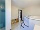 Bright bathroom featuring a tiled shower and jetted tub at 705 Cypress St, Tarpon Springs, FL 34689