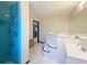 Bright bathroom featuring a tiled shower and jetted tub at 705 Cypress St, Tarpon Springs, FL 34689