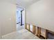 View into the unfinished utility room, with exposed framing, and doorway leading to the rest of the house at 705 Cypress St, Tarpon Springs, FL 34689