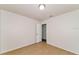 Bedroom featuring tile flooring and a doorway leading to another room at 7517 Oxwood St, North Port, FL 34287