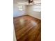 Bright bedroom with wood-look flooring and natural light, creating a serene and comfortable atmosphere at 7734 Judith Cres, Port Richey, FL 34668