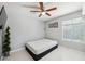 Minimalist bedroom with a platform bed, bright lighting and space for custom furnishing at 7903 Lake Placid Ln, Trinity, FL 34655