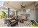 View of an outdoor patio with ceiling fan and furniture at 7903 Lake Placid Ln, Trinity, FL 34655