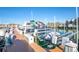 Community boat dock on the water with boat lifts and slips for residents at 8000 Sailboat Key S Blvd # 202, St Pete Beach, FL 33707