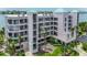 This attractive condo boasts balconies and lush landscaping, set in a tropical paradise at 8000 Sailboat Key S Blvd # 202, St Pete Beach, FL 33707