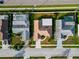 Aerial view of homes and yards next to major roadway at 8127 Tarsier Ave, New Port Richey, FL 34653