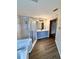 Bathroom featuring wood floors, large vanity, and glass shower at 8127 Tarsier Ave, New Port Richey, FL 34653