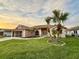 Beautiful single-Gathering home with a well manicured lawn and tasteful landscaping at 8127 Tarsier Ave, New Port Richey, FL 34653
