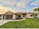 Charming single-story home with a well-manicured lawn and appealing curb appeal at 8127 Tarsier Ave, New Port Richey, FL 34653