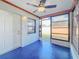 View of patio with access to the backyard, ceiling fan, and outdoor lighting at 8127 Tarsier Ave, New Port Richey, FL 34653