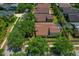 Aerial view of a neighborhood with mature trees and well-maintained homes at 8211 Canyon Creek Way, Tampa, FL 33647