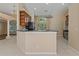 Bright kitchen featuring a breakfast bar, ample cabinet space, and modern appliances at 8211 Canyon Creek Way, Tampa, FL 33647