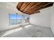 Spacious room with large windows offering a scenic waterfront view at 829 E Gulf Blvd # 107, Indian Rocks Beach, FL 33785