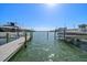 Waterfront condo featuring a private boat dock with deep water access at 829 E Gulf Blvd # 107, Indian Rocks Beach, FL 33785