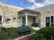 Indian Rocks Beach Library featuring a charming exterior, turtle art, and a welcoming entrance with benches at 829 E Gulf Blvd # 107, Indian Rocks Beach, FL 33785