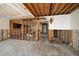 Interior view of a home with exposed framing and a concrete floor at 829 E Gulf Blvd # 107, Indian Rocks Beach, FL 33785