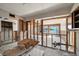 Waterfront living room under construction with exposed studs offering scenic views of the channel at 829 E Gulf Blvd # 107, Indian Rocks Beach, FL 33785