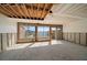 Living room being renovated featuring large windows and bright, airy space at 829 E Gulf Blvd # 107, Indian Rocks Beach, FL 33785