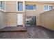 Patio with brick pavers and sliding doors leading into the home's living area at 829 E Gulf Blvd # 107, Indian Rocks Beach, FL 33785