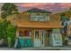 Kooky Coconut exterior featuring a vibrant facade, inviting entrance, and signs for treats like tacos, ice cream, and water at 829 E Gulf Blvd # 107, Indian Rocks Beach, FL 33785