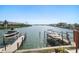 Waterfront view showing the boats and boat lift at 829 E Gulf Blvd # 107, Indian Rocks Beach, FL 33785