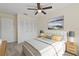Bright bedroom with a neutral color palette, closet space, and minimalist style that is move-in ready at 9922 86Th Way, Seminole, FL 33777