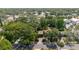 Aerial view of a home surrounded by mature trees at 111 Orangeview Ave, Clearwater, FL 33755