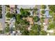 Aerial view of a residential neighborhood showcasing property layout, trees, and street access at 111 Orangeview Ave, Clearwater, FL 33755