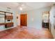 Bedroom with hardwood floors, built-in storage, and an ensuite bathroom at 111 Orangeview Ave, Clearwater, FL 33755