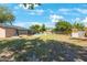Spacious backyard featuring a pool, playset, screened porch, and a lush lawn perfect for recreation at 1159 19Th Sw Ave, Largo, FL 33778