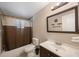 Updated bathroom with vanity, dark framed mirror, and shower-tub combo at 1159 19Th Sw Ave, Largo, FL 33778