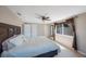 Bedroom featuring a ceiling fan, a large window, and neutral walls at 1159 19Th Sw Ave, Largo, FL 33778