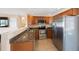 Well-appointed kitchen featuring stainless steel appliances and granite countertops at 1159 19Th Sw Ave, Largo, FL 33778